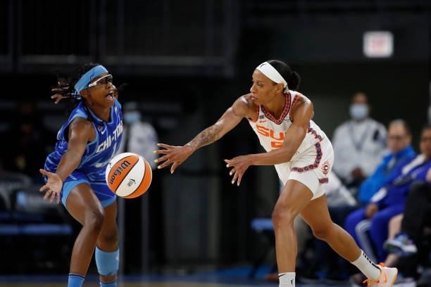 Jasmine Thomas of the Connecticut Sun passes the ball during the game against Diamond DeShields of the Chicago Sky on June 17, 2021 at the Wintrust...