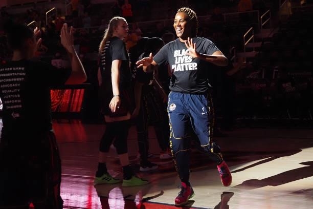 Jantel Lavender of the Indiana Fever high fives before the game against the Seattle Storm on June 17, 2021 at Indiana Farmers Coliseum Fieldhouse in...