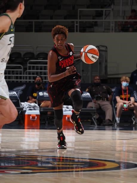 Danielle Robinson of the Indiana Fever dribbles the ball during the game against the Seattle Storm on June 17, 2021 at Indiana Farmers Coliseum...