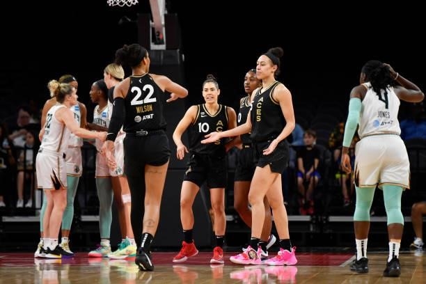 The Las Vegas Aces high five during the game against the New York Liberty on June 17, 2021 at Michelob ULTRA Arena in Las Vegas, Nevada. NOTE TO...