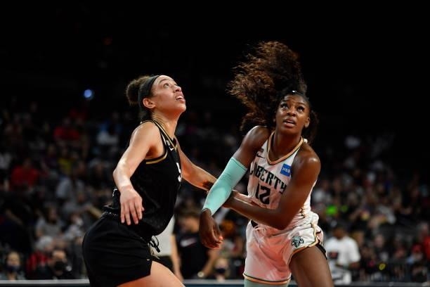 Michaela Onyenwere of the New York Liberty plays defense on Dearica Hamby of the Las Vegas Aces during the game on June 17, 2021 at Michelob ULTRA...