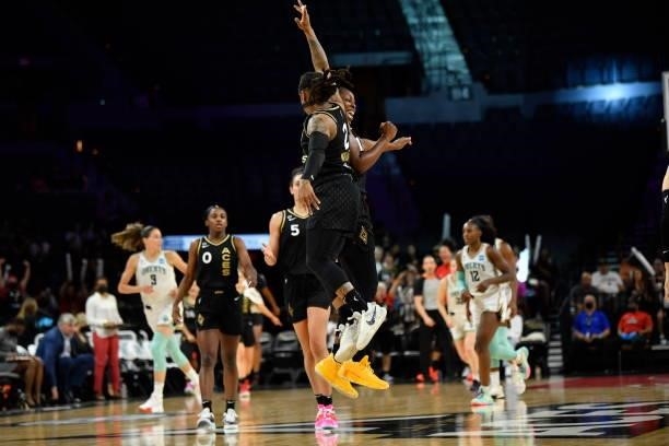 Chelsea Gray of the Las Vegas Aces and Riquna Williams of the Las Vegas Aces celebrate during the game against the New York Liberty on June 17, 2021...