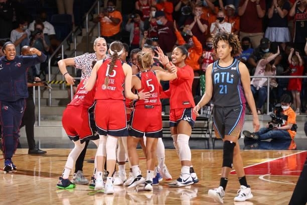 The Washington Mystics celebrate after the game against the Atlanta Dream on June 17, 2021 at Entertainment & Sports Arena in Washington, DC. NOTE TO...