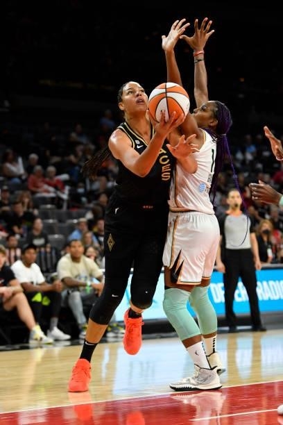Liz Cambage of the Las Vegas Aces drives to the basket during the game against the New York Liberty on June 17, 2021 at Michelob ULTRA Arena in Las...