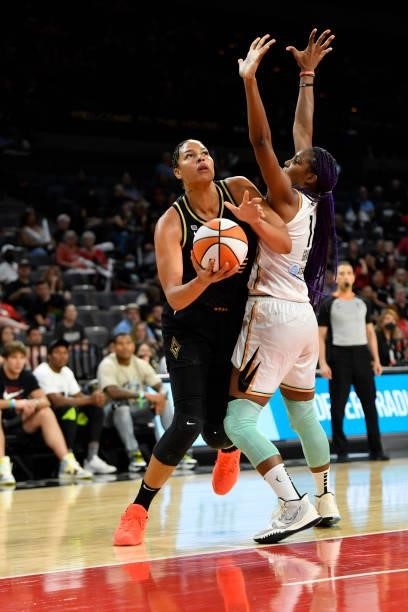 Liz Cambage of the Las Vegas Aces drives to the basket during the game against the New York Liberty on June 17, 2021 at Michelob ULTRA Arena in Las...