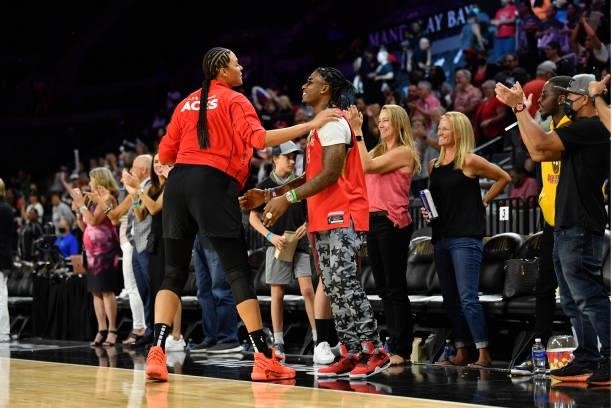 Liz Cambage of the Las Vegas Aces talks with Music artist, CJ SO COOL after the game against the New York Liberty on June 17, 2021 at Michelob ULTRA...