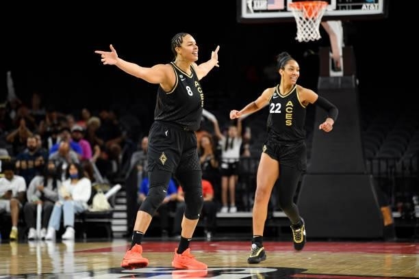 Liz Cambage of the Las Vegas Aces and A'ja Wilson of the Las Vegas Aces celebrate during the game against the New York Liberty on June 17, 2021 at...