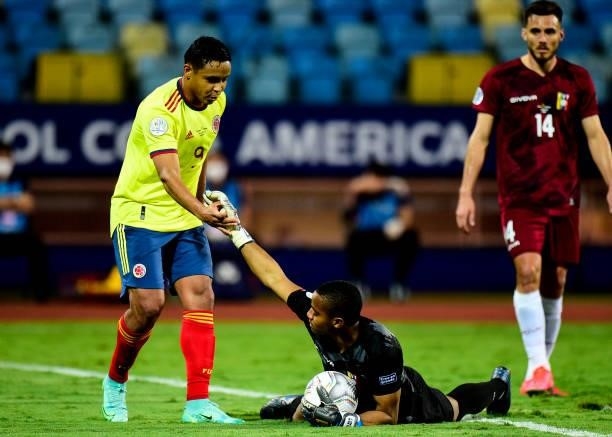 Wuilker Farinez of Venezuela shakes hands with Luis Muriel of Colombia during the match between Colombia and Venezuela as part of Conmebol Copa...