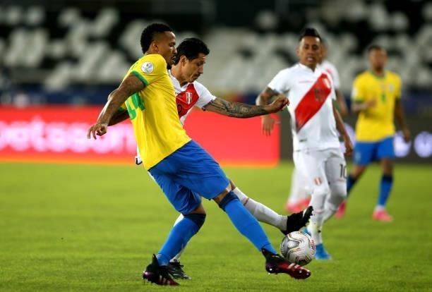 Eder Militao of Brazil competes for the ball with Gianluca Lapadula of Peru during the match between Brazil and Peru as part of the Conmebol Copa...