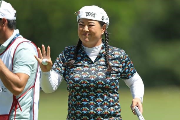 Christina Kim acknowledges the crowd after finishing the first round of the Meijer LPGA Classic for Simply Give golf tournament at Blythefield...