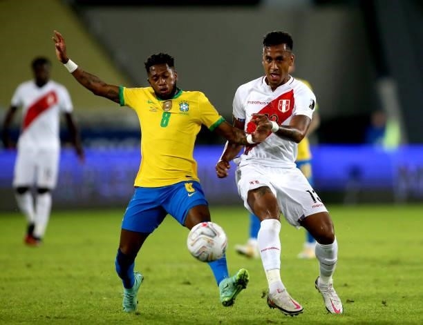 Fred of Brazil competes for the ball with Renato Tapia of Peru during the match between Brazil and Peru as part of the Conmebol Copa America Brazil...