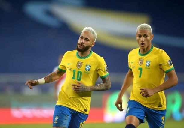 Neymar of Brazil celebrates after scoring a goal with team mate Richarlison during the match between Brazil and Peru as part of the Conmebol Copa...
