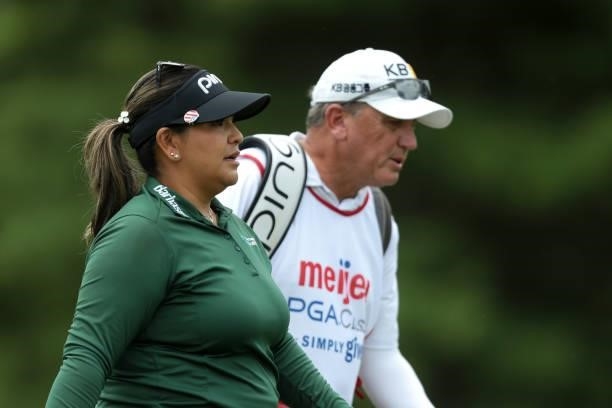 Lizette Salas and caddie walk on the 10th hole during the first round of the Meijer LPGA Classic for Simply Give golf tournament at Blythefield...