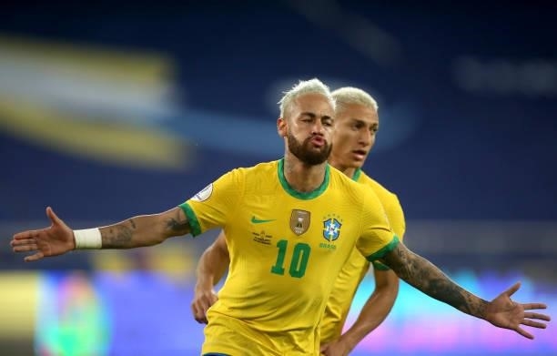 Neymar of Brazil celebrates after scoring a goal with team mate Richarlison during the match between Brazil and Peru as part of the Conmebol Copa...