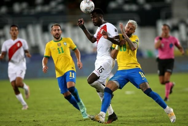 Neymar of Brazil competes for the ball with Christian Ramos of Peru during the match between Brazil and Peru as part of Conmebol Copa America Brazil...