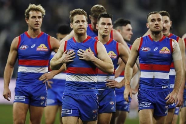 Lachie Hunter of the Bulldogs looks dejected after a loss during the 2021 AFL Round 14 match between the Geelong Cats and the Western Bulldogs at...