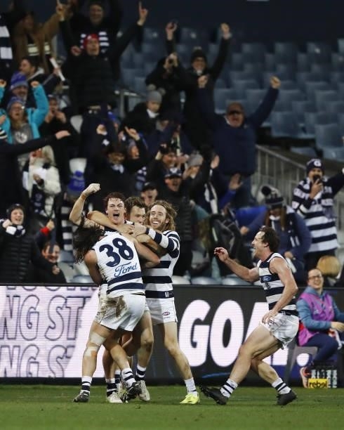 Gary Rohan of the Cats celebrates with Shaun Higgins of the Cats, Jack Henry of the Cats and Cameron Guthrie of the Cats after kicking a goal to win...