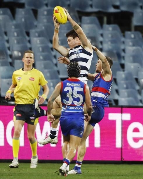 Gary Rohan of the Cats marks the ball in the dying seconds during the 2021 AFL Round 14 match between the Geelong Cats and the Western Bulldogs at...