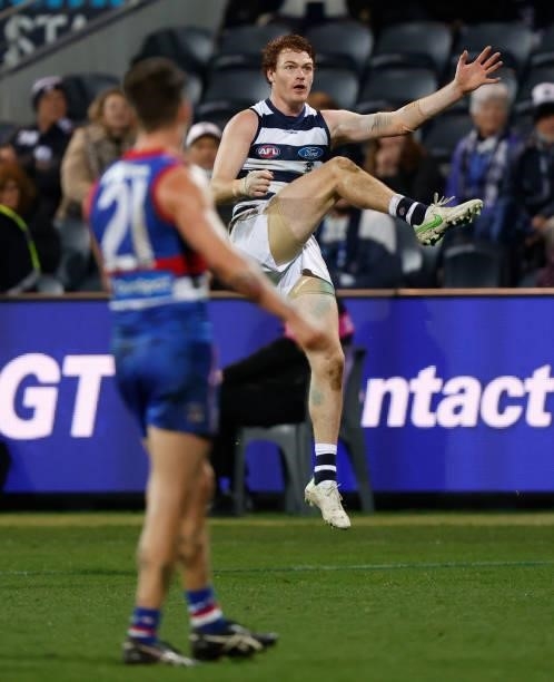 Gary Rohan of the Cats kicks a goal after the siren to win the match during the 2021 AFL Round 14 match between the Geelong Cats and the Western...