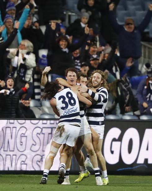 Gary Rohan of the Cats celebrates with Shaun Higgins of the Cats, Jack Henry of the Cats and Cameron Guthrie of the Cats after kicking a goal to win...