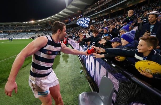 Patrick Dangerfield of the Cats celebrates with the crowd after the 2021 AFL Round 14 match between the Geelong Cats and the Western Bulldogs at...