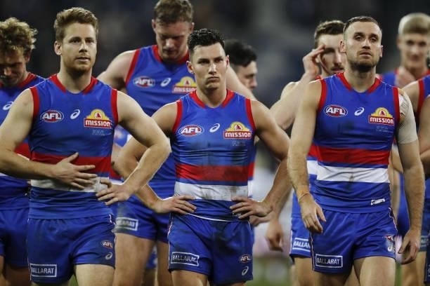 Anthony Scott of the Bulldogs looks dejected after a loss during the 2021 AFL Round 14 match between the Geelong Cats and the Western Bulldogs at...