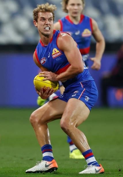 Mitch Wallis of the Bulldogs in action during the 2021 AFL Round 14 match between the Geelong Cats and the Western Bulldogs at GMHBA Stadium on June...