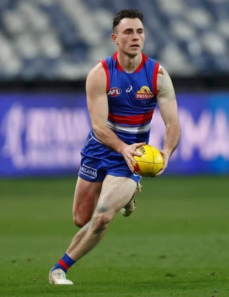 Toby McLean of the Bulldogs in action during the 2021 AFL Round 14 match between the Geelong Cats and the Western Bulldogs at GMHBA Stadium on June...