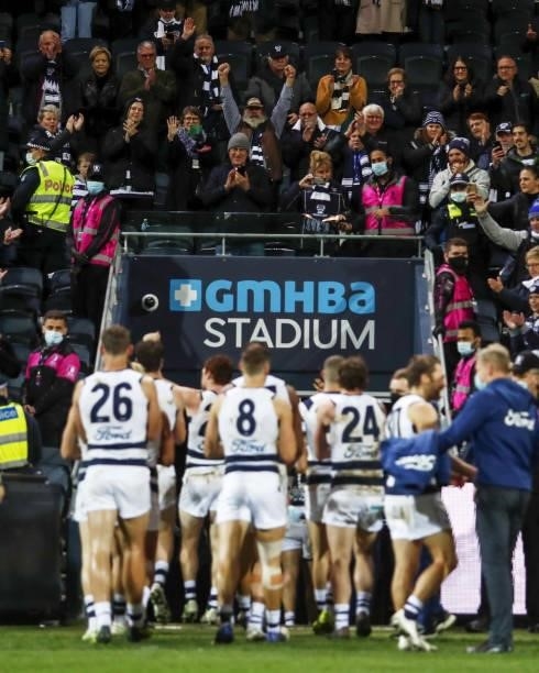 Geelong Cats leave the field after a win during the 2021 AFL Round 14 match between the Geelong Cats and the Western Bulldogs at GMHBA Stadium on...