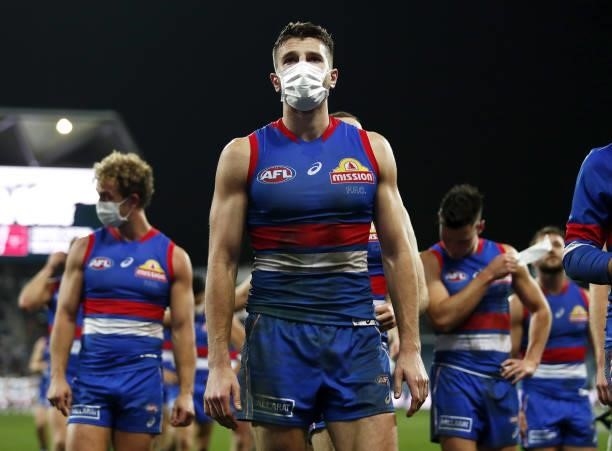 Marcus Bontempelli of the Bulldogs leaves the field after a loss during the 2021 AFL Round 14 match between the Geelong Cats and the Western Bulldogs...