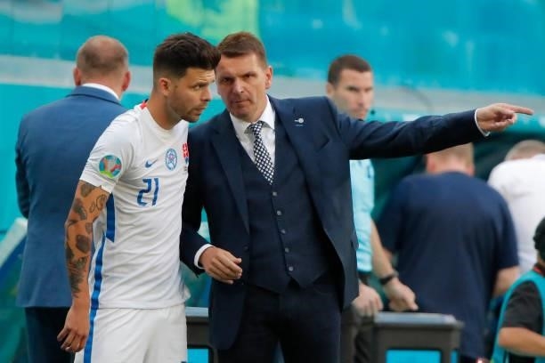 Slovakia's coach Stefan Tarkovic speaks to Slovakia's forward Michal Duris during the UEFA EURO 2020 Group E football match between Sweden and...