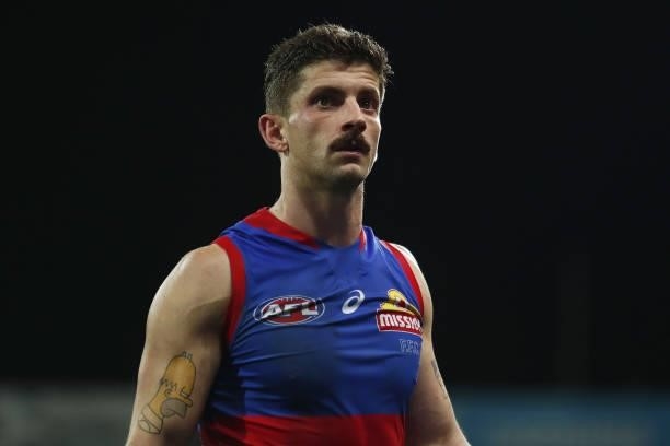 Tom Liberatore of the Bulldogs looks dejected after a loss during the 2021 AFL Round 14 match between the Geelong Cats and the Western Bulldogs at...