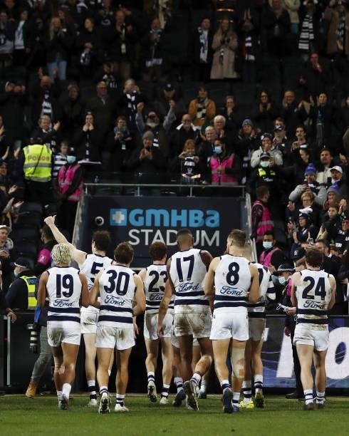 Geelong Cats leave the field after a win during the 2021 AFL Round 14 match between the Geelong Cats and the Western Bulldogs at GMHBA Stadium on...