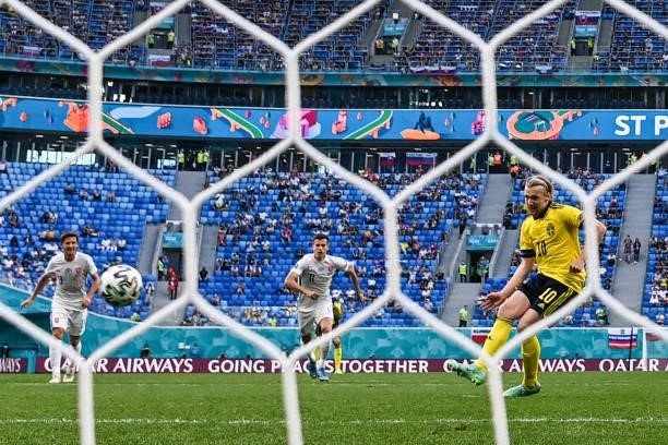 Sweden's midfielder Emil Forsberg scores a penalty during the UEFA EURO 2020 Group E football match between Sweden and Slovakia at Saint Petersburg...