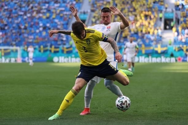 Slovakia's forward Robert Mak challenges Sweden's defender Victor Lindelof during the UEFA EURO 2020 Group E football match between Sweden and...