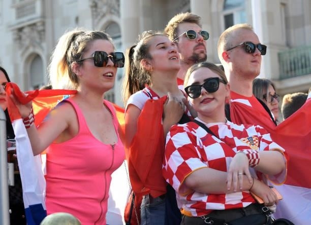 Supporters react as they watch a broadcast of the UEFA EURO 2020 football match between Croatia and Czech Republic at the Jelacic square in Zagreb,...
