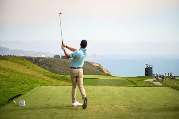 Michael Johnson watches as he plays his shot from the third tee during the first round of the 121st U.S. Open on the South Course at Torrey Pines...