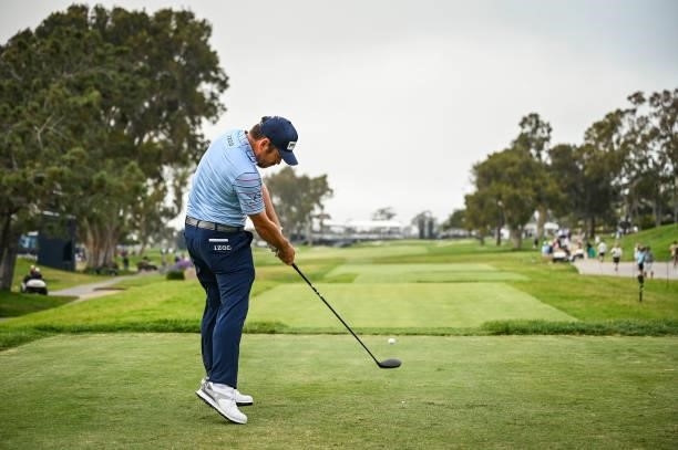 Louis Oosthuizen of South Africa at impact as he plays his shot from the 18th tee during the first round of the 121st U.S. Open on the South Course...