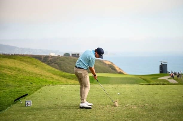 Michael Johnson at impact as he plays his shot from the third tee during the first round of the 121st U.S. Open on the South Course at Torrey Pines...