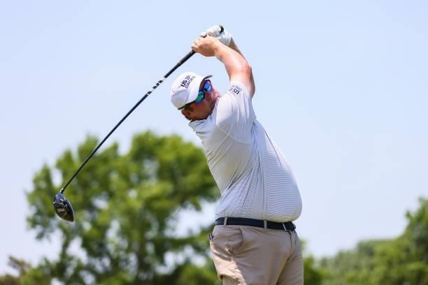Conrad Shindler plays his shot from the 10th tee during the second round of the Wichita Open Benefitting KU Wichita Pediatrics at Crestview Country...
