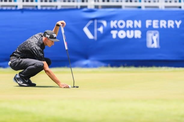 Garett Reband lines up his putt on the 18th green during the second round of the Wichita Open Benefitting KU Wichita Pediatrics at Crestview Country...