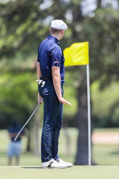 Harry Hall watches his putt on the 18th green during the second round of the Wichita Open Benefitting KU Wichita Pediatrics at Crestview Country Club...
