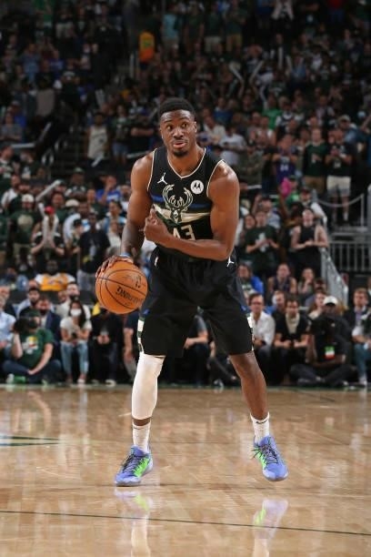 Thanasis Antetokounmpo of the Milwaukee Bucks handles the ball against the Brooklyn Nets during Round 2, Game 6 of the 2021 NBA Playoffs on June 17,...