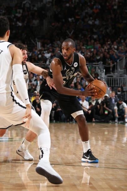 Khris Middleton of the Milwaukee Bucks handles the ball against the Brooklyn Nets during Round 2, Game 6 of the 2021 NBA Playoffs on June 17, 2021 at...