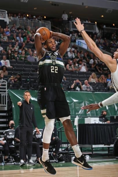 Khris Middleton of the Milwaukee Bucks looks to shoot the ball against the Brooklyn Nets during Round 2, Game 5 of the 2021 NBA Playoffs on June 17,...