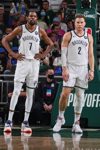 Kevin Durant and Blake Griffin of the Brooklyn Nets look on against the Milwaukee Bucks during Round 2, Game 6 of the 2021 NBA Playoffs on June 17,...