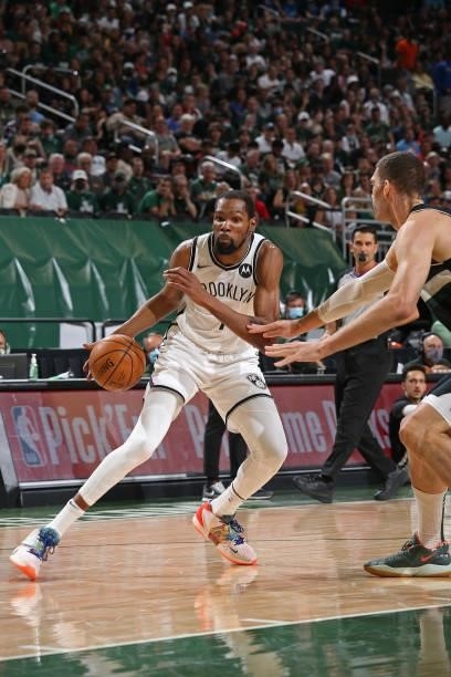 Kevin Durant of the Brooklyn Nets handles the ball against the Milwaukee Bucks during Round 2, Game 5 of the 2021 NBA Playoffs on June 17, 2021 at...