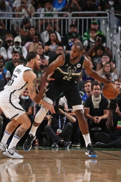 Mike James of the Brooklyn Nets plays defense on Khris Middleton of the Milwaukee Bucks during Round 2, Game 5 of the 2021 NBA Playoffs on June 17,...