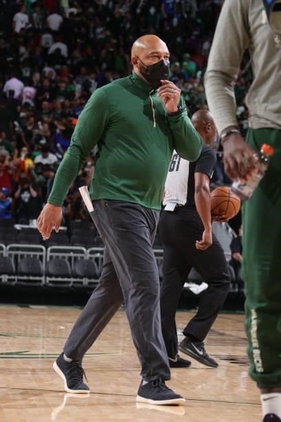 Assistant Coach Darvin Ham of the Milwaukee Bucks walks down the court during the game against the Brooklyn Nets during Round 2, Game 6 of the 2021...
