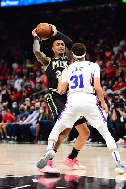 John Collins of the Atlanta Hawks looks to pass the ball against the Philadelphia 76ers during Round 2, Game 6 of the Eastern Conference Playoffs on...